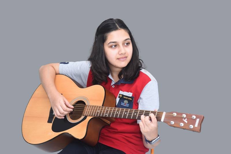 Children learning music and movement at Harvest International School